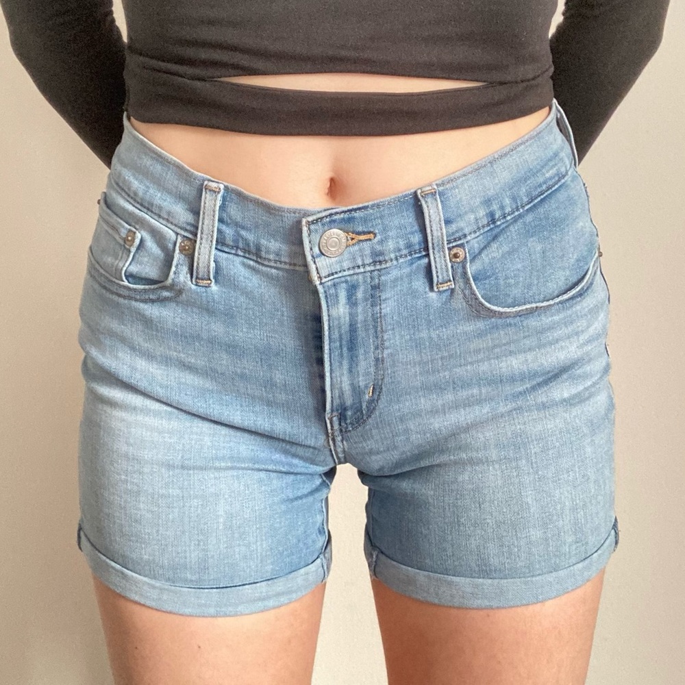 levis mid length high rise light denim shorts